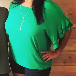Green blouse with ruffle sleeves